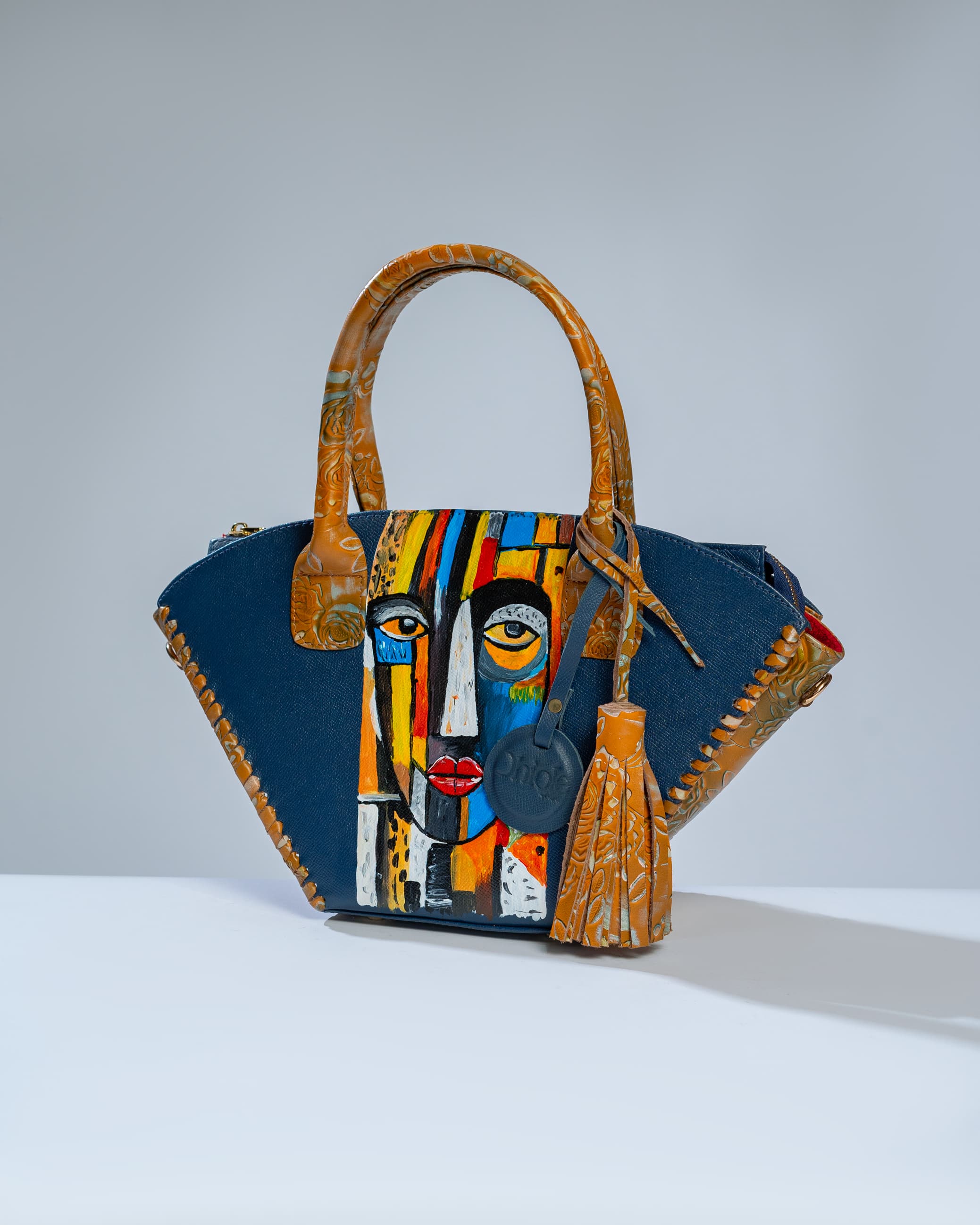 Blue and brown cone bag- mystical face inspired.