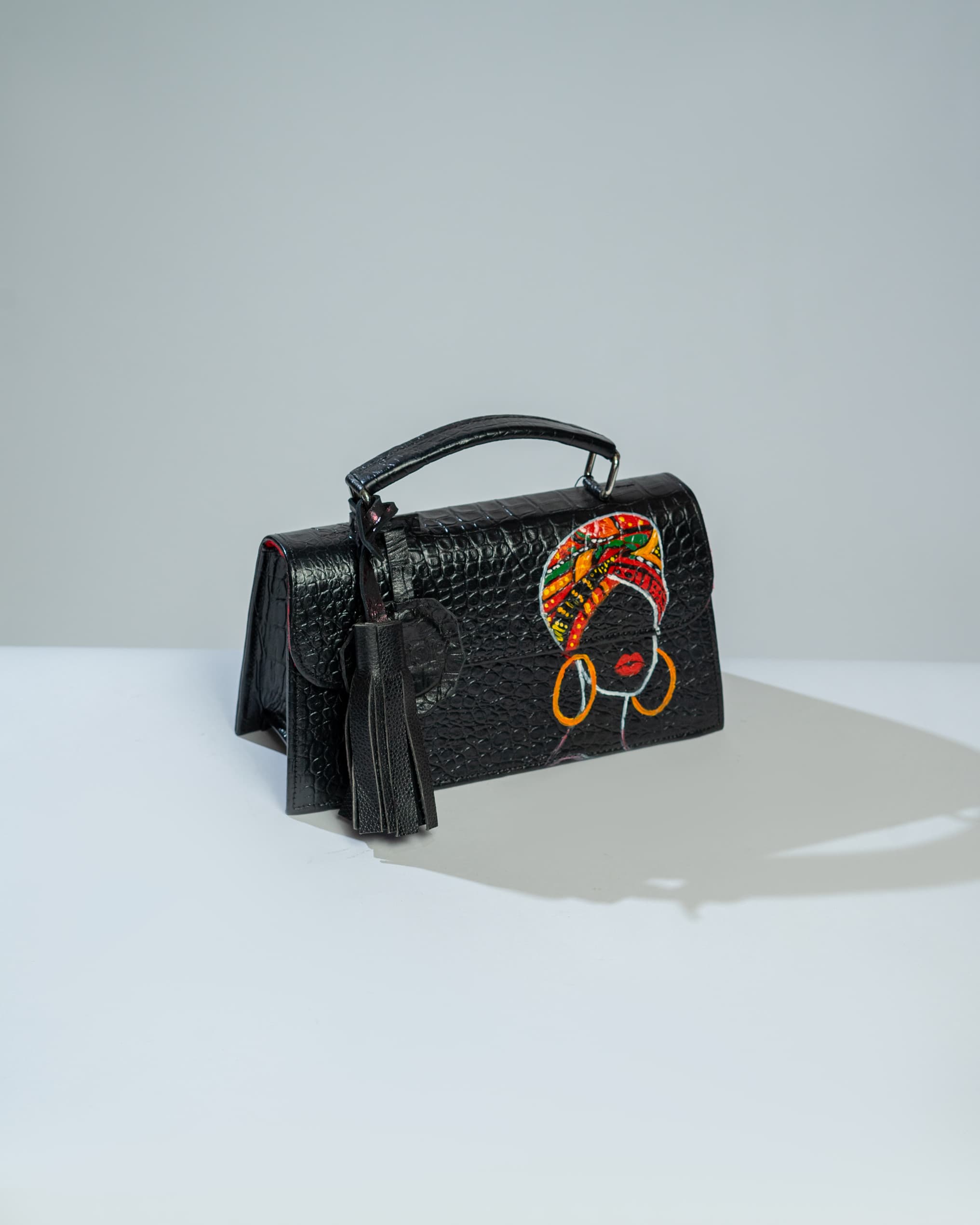 Black tatai handheld bag- Shadow inspired.