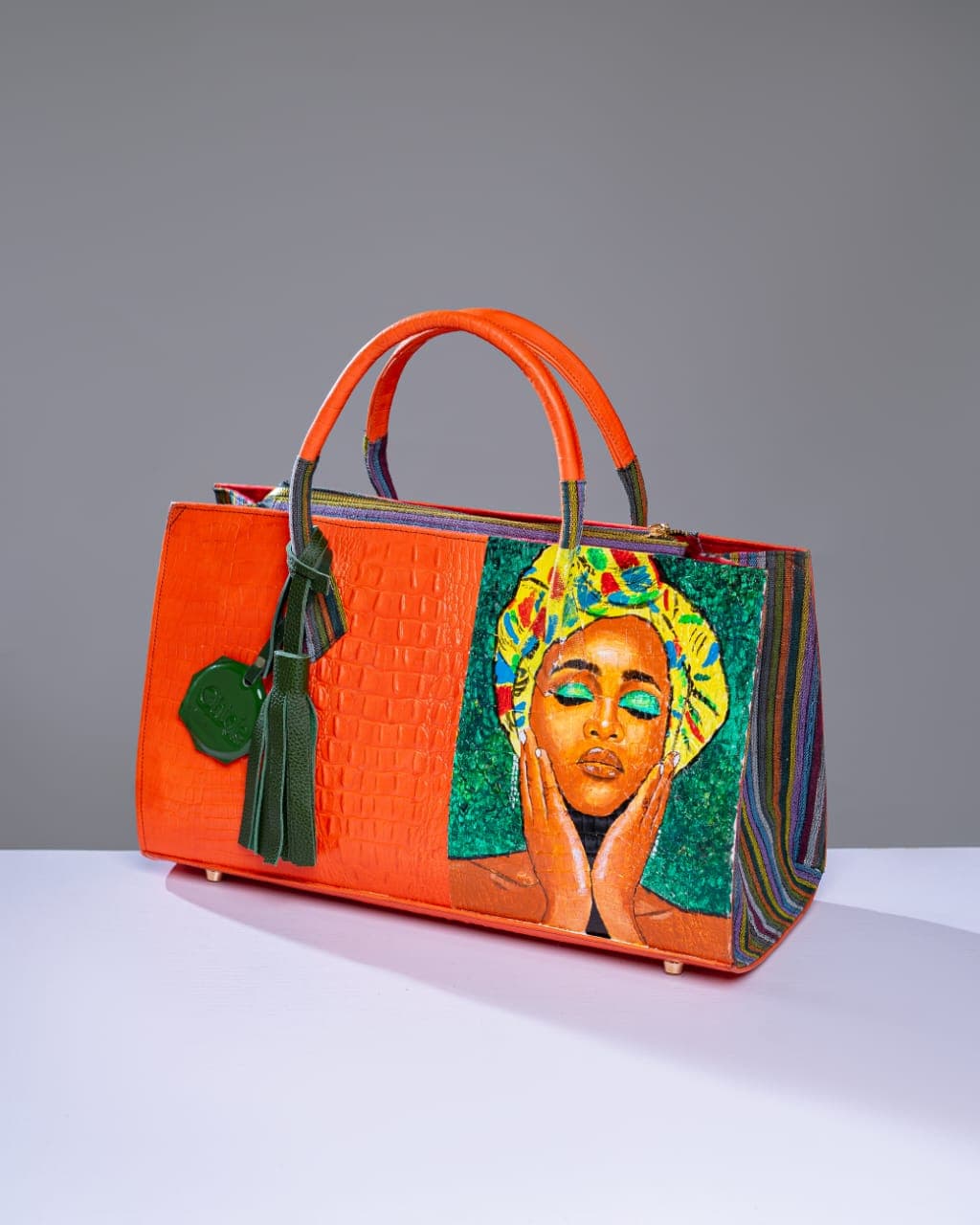 Bright Orange Asoʻ-okè, leather mix (Aduke) Bag