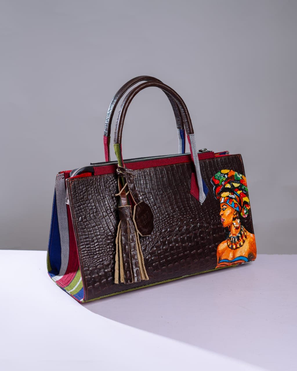 Brown Leather and Asoʻ-okè mix (Adùkè Bag)